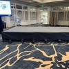 Bil-jax stage with carpet covering top